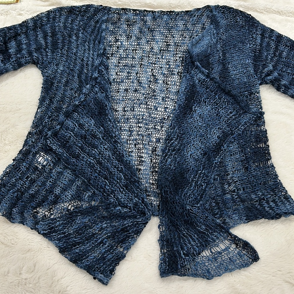 Crocheted sweater in blues with multiple wear options. Size L/XL, short sleeve